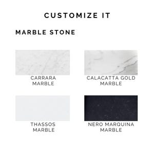 May include: Image showcasing four marble stone options: Carrara, Calacatta Gold, Thassos, and Nero Marquina. The text "CUSTOMIZE IT" and "MARBLE STONE" are displayed at the top. Each marble type is presented with its name below a rectangular sample.