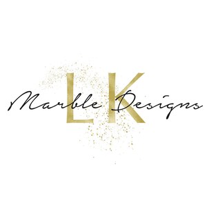 May include: Gold letters "LK" with a gold glitter effect behind them. The text "Marble Designs" is written in black cursive script below the letters.