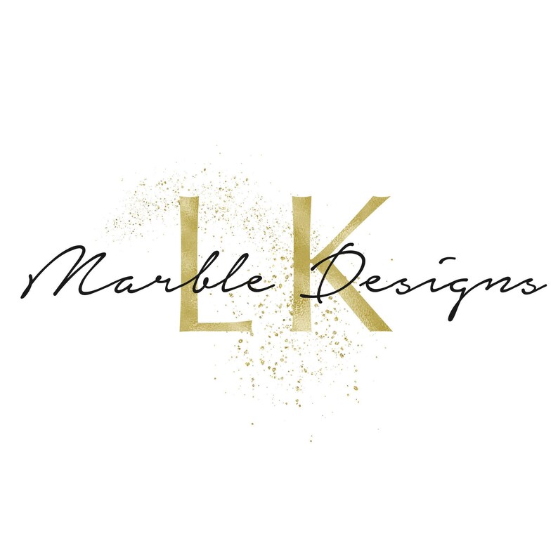 May include: Gold letters "LK" with a gold glitter effect behind them. The text "Marble Designs" is written in black cursive script below the letters.