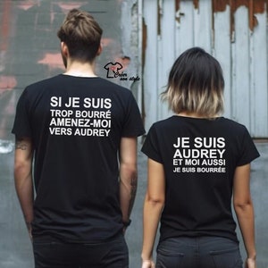 Könnte beinhalten: Zwei schwarze T-Shirts mit weißem Text. Das erste Shirt sagt "Si je suis trop bourré amenez-moi vers Audrey". Das zweite Shirt sagt "Je suis Audrey et moi aussi je suis bourrée".