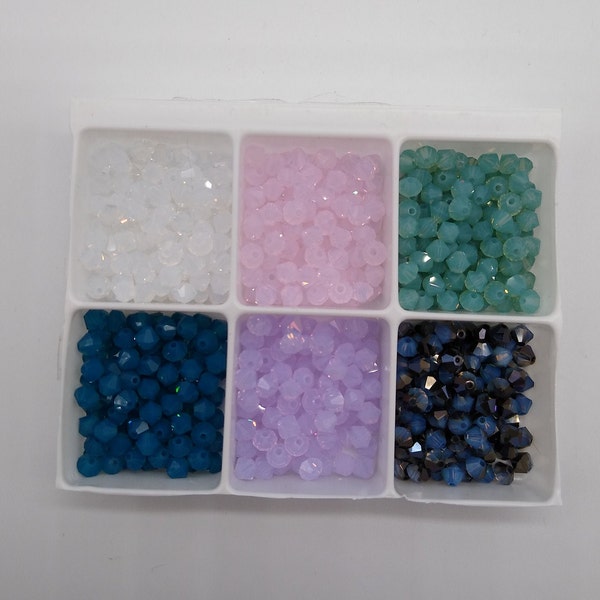 Perles toupies en cristal Swarovski opale ; 4 mm, 5 mm, 6 mm ; Opale violette, opale du Pacifique, opale de feu, opale bleu des Caraïbes, opale bleu aérien, eau de rose