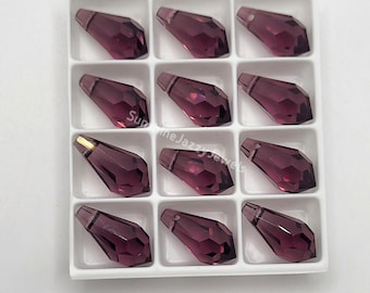 May include: A dozen faceted, teardrop-shaped, dark purple glass beads are arranged in a white grid. Each bead has a hole at the top for stringing. The beads are displayed in a white plastic tray. The text "Sunshine Jazzy Jewels" is visible.