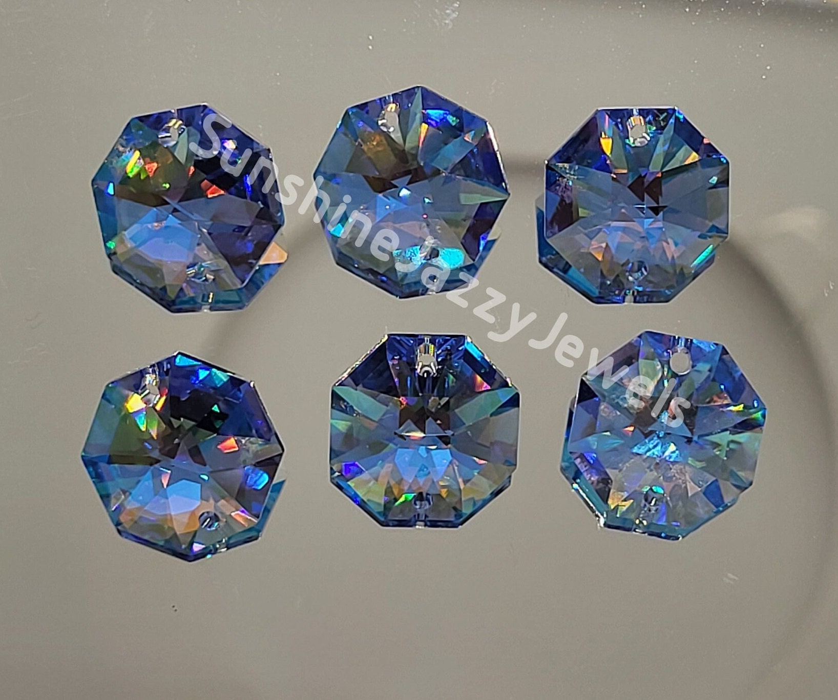 6pc Swarovski Crystal Sapphire Blue AB 14mm 2 Hole Octagon 6pc Swarovski Crystal Sapphire Blue AB 14mm 2 Hole Octagon