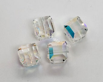 Cuentas Swarovski Crystal Clear AB Faceted Cube 5601; 5 tamaños: 6 mm (6 piezas), 8 mm (6 piezas), 10 mm (4 piezas), 12 mm (4 piezas), 14 mm (2 piezas)