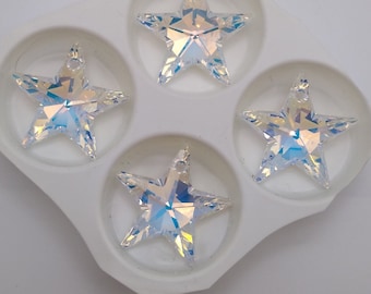 May include: Four iridescent clear star-shaped crystal charms with a hole at the top for hanging.