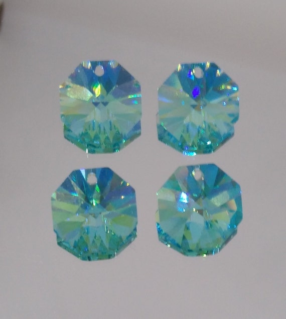 スワロフスキー #8115 14mm クリスタルブルーAB 100粒 4pc Swarovski Crystal Antique Green Blue AB 14mm 1-hole