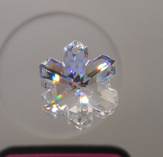5328. Glass Snowflake Charms.