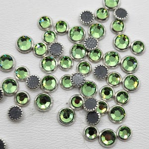 CLEARANCE MIX!  50+ Swarovski Crystal Peridot Silver Rimmed Flatback Hotfix Rhinestones; Mixed Sizes