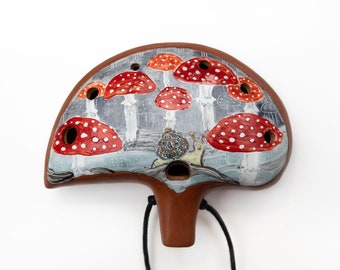 Ceramic ocarina Snail trip under Amanita. Beautiful ceramic flute with on-glaze painting