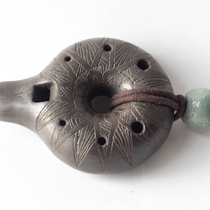 Ceramic Ocarina Black Donut. Woodwind Instrument with engraved star. Bagel Necklace black ceramic gift. Woodwind ceramic flute donut pendant