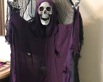 The Purple Phantom 6 foot hanging Halloween skeleton
