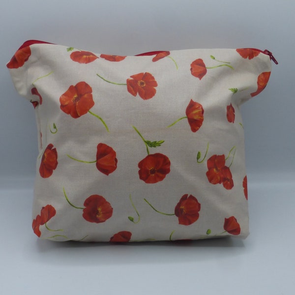 Trousse de toilette doublée fleurs coquelicots rouges beige en coton enduit