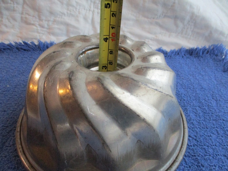 Round antique tin cake or jello mold