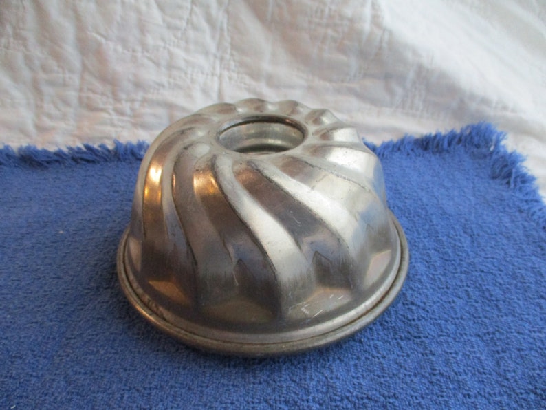 Round antique tin cake or jello mold