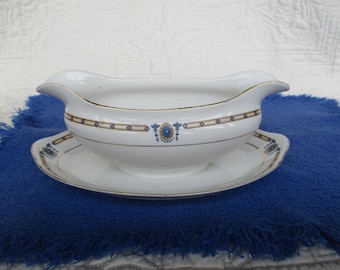 Noritake Nippon gravy boat with attached underplate, circa 1911-1914, small rim chip, dark blue and gold