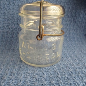 Antique 1/2 pint Atlas E-Z Seal canning jar with wire bale & glass lid