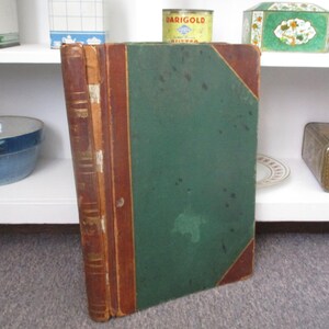 May include: A rustic wooden sign with the text "Welcome to our porch" in white lettering. The sign features a distressed finish and a simple, inviting design, perfect for outdoor decor.