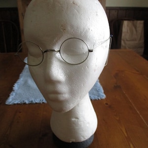 Antique wire rimmed bifocal eyeglasses, spectacles with wire ear pieces
