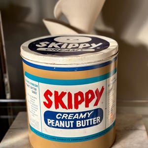 Vintage Skippy Peanut Butter Tin Coin Bank: 1960s Advertising Collectible