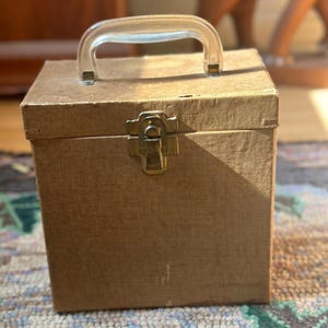 Vintage 45 RPM Record Collection: Red Platter Pak Case with 55 Vinyls