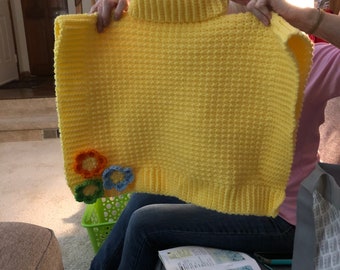 Girls Poncho child’s Small, Medium, or large. Small is approximately 2-3T.  Pattern by Lucky Penny