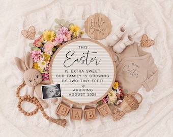 May include: A wooden sign with the text "This Easter is extra sweet our family is growing by two tiny feet! Arriving August 2024" surrounded by flowers, a baby onesie, and other baby items.