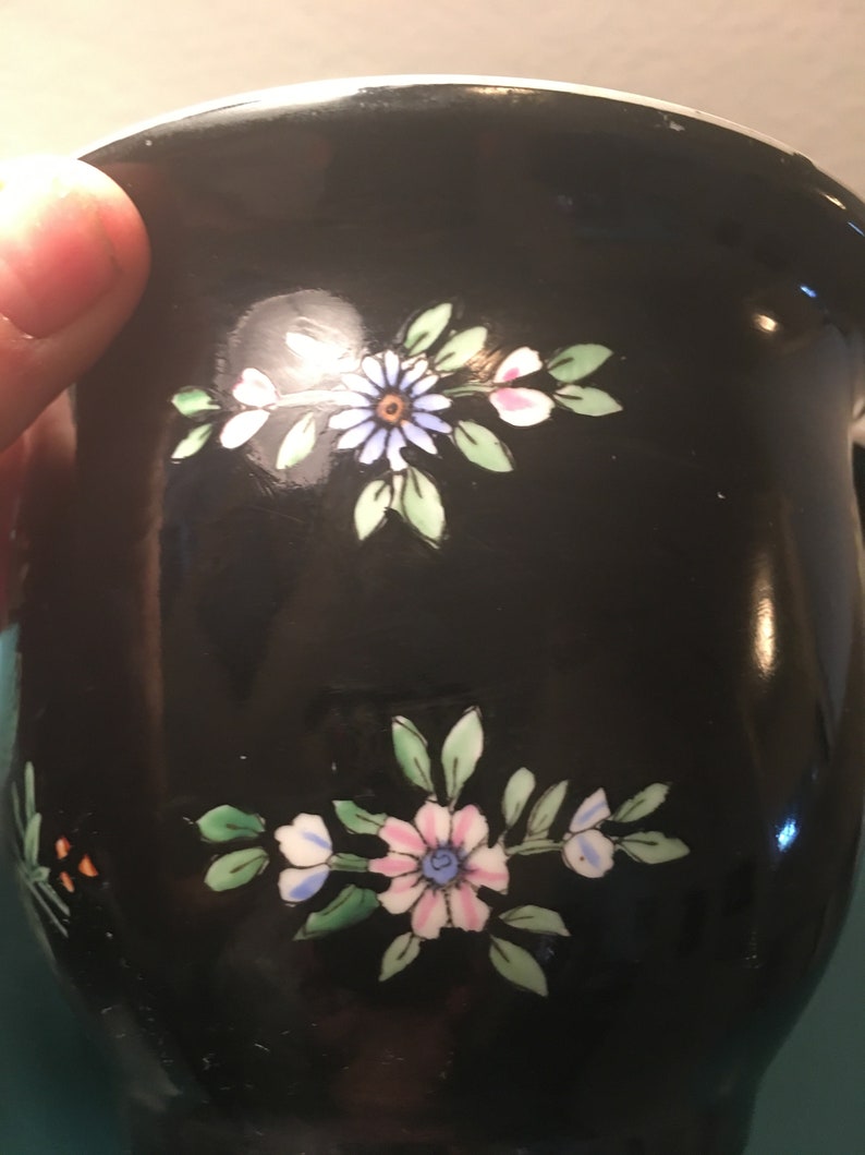 Pair of vintage Chinese black floral fish bowlsplanters