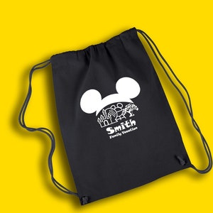 May include: Black drawstring bag with a white Mickey Mouse head design and the text "Smith Family Vacation".