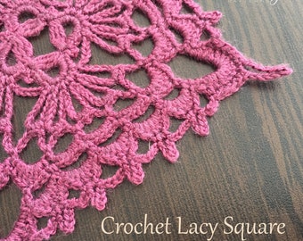 May include: A dark pink crocheted square with an intricate lacy floral pattern. The text "Crochet Design PATTERNS" appears in the top right corner, and the text "Crochet Lacy Square" and "Crochet Pattern" are at the bottom.