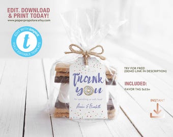 May include: A thank you favor tag with a donut graphic and the text "Thank you for sprinkling us with love! Annie & Elizabeth". The tag is tied to a clear cellophane bag filled with a stack of graham crackers, chocolate, and marshmallows.