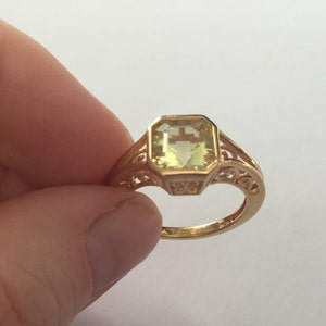 A 2.25 ct gold 'Asscher' cut quartz solitaire ring 14 ct gold vermeil and silver openwork gallery
