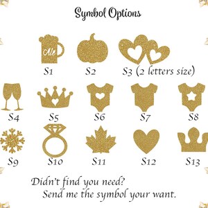 May include: A chart with 13 different gold glitter symbols, each with a letter designation from S1 to S13. The symbols include a beer mug, pumpkin, two hearts, wine glasses, a crown, a onesie with a heart, a onesie with a star, a snowflake, a ring, a maple leaf, a heart, and a crown. The text "Symbol Options" is at the top of the chart. The text "Didn't find you need? Send me the symbol your want." is at the bottom of the chart.
