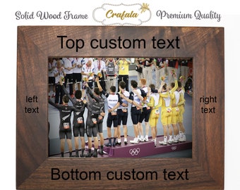 May include: A brown wooden picture frame with a photo of a group of cyclists on a podium. The frame has the text "Top custom text" at the top, "left text" on the left, "right text" on the right, and "Bottom custom text" at the bottom.