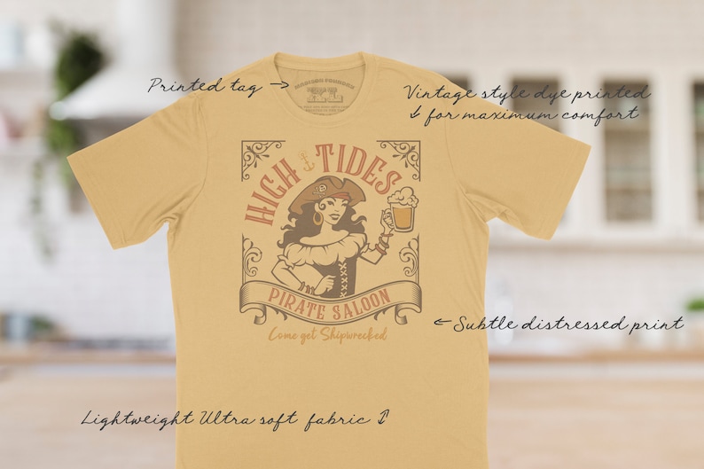The High Tides Pirate Saloon tee has a vintage distressed design.  These shirts are so soft and comfy that you will want to wear it year round.  The designs and tags are dye printed for  comfort.   The shirts are available in many sizes and colors.