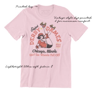 The Derby Dames tee has a vintage distressed design.  These shirts are so buttery soft and comfy that you will want to wear it year round.  The designs and tags are dye printed for  comfort.   The shirts are available in many sizes and colors.