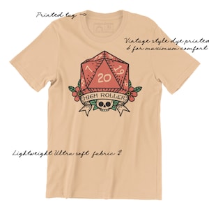 The High Roller tee has a vintage distressed design.  These shirts are so buttery soft and comfy that you will want to wear it year round.  The designs and tags are dye printed for  comfort.   The shirts are available in many sizes and colors.