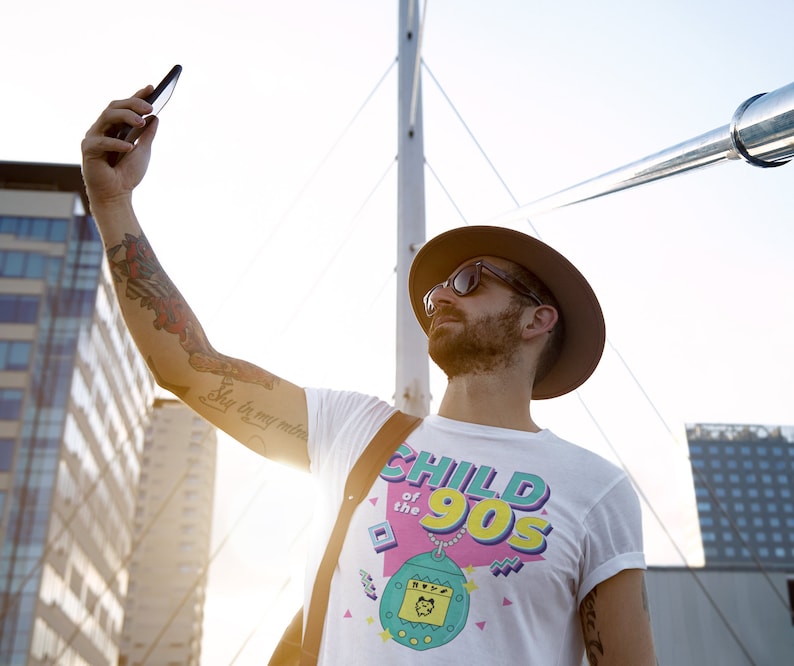 Model wearing Child of the 90s tee
