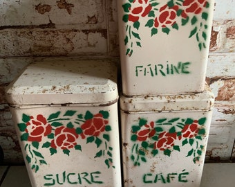 French antique tin canisters , set of three