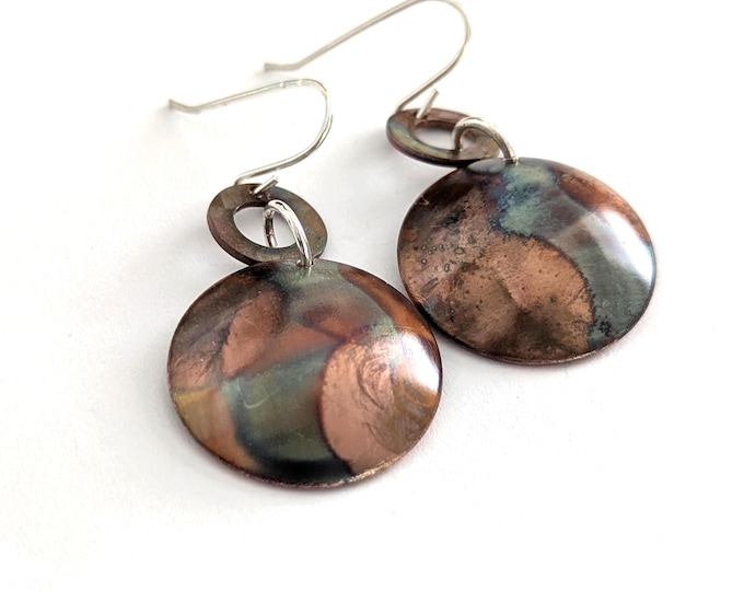 Domed dangle earrings; flame painted copper, sterling silver hooks