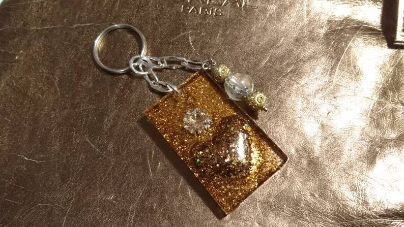 Handgjord nyckelring Glittertema!