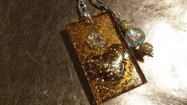 Handgjord nyckelring Glittertema!