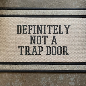 Definitely Not A Trap Door - funny door mat- heavy