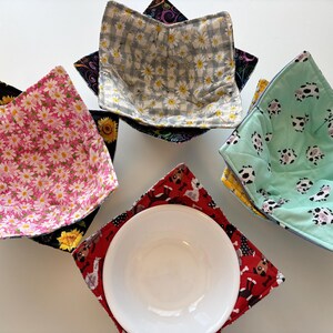 Porta recipientes aislante