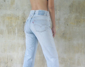 Beautiful , faded jeans ,vintage 80s  90s levis 501 W26 W26.5 ,levis for women,levis light wash ,hipster,cool ,levis retro ,levis usa