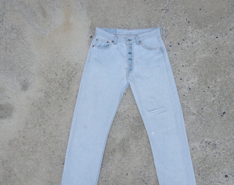 Faded jeans, vintage levis 501 light blue W28.5 L31, levis ripped,Distressed,cool,retro,hipster ,levis Made in usa