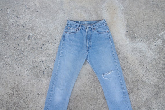 Faded jeans, vintage levis 501 blue jeans W28 L31.