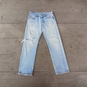 Ripped 501 Levis 
