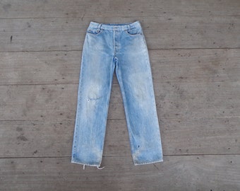 Jeans en détresse, vintage levis 701 étudiant fit W30 L 30, levis déchiré, Distressed, cool, hipster, rétro, levis Made in usa