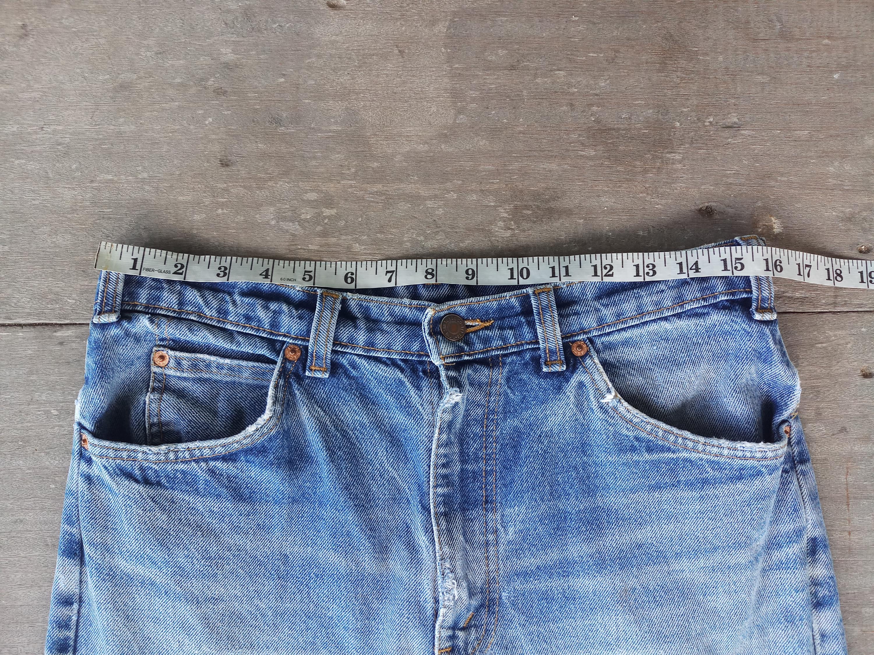 Vintage Levis 505 Jeans: 80s Faded Denim, Orange Tab (W32 L34