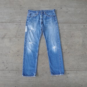 Vintage Levi&#39;s 505 Ripped Blue Jeans - W34 L31 Distressed Denim